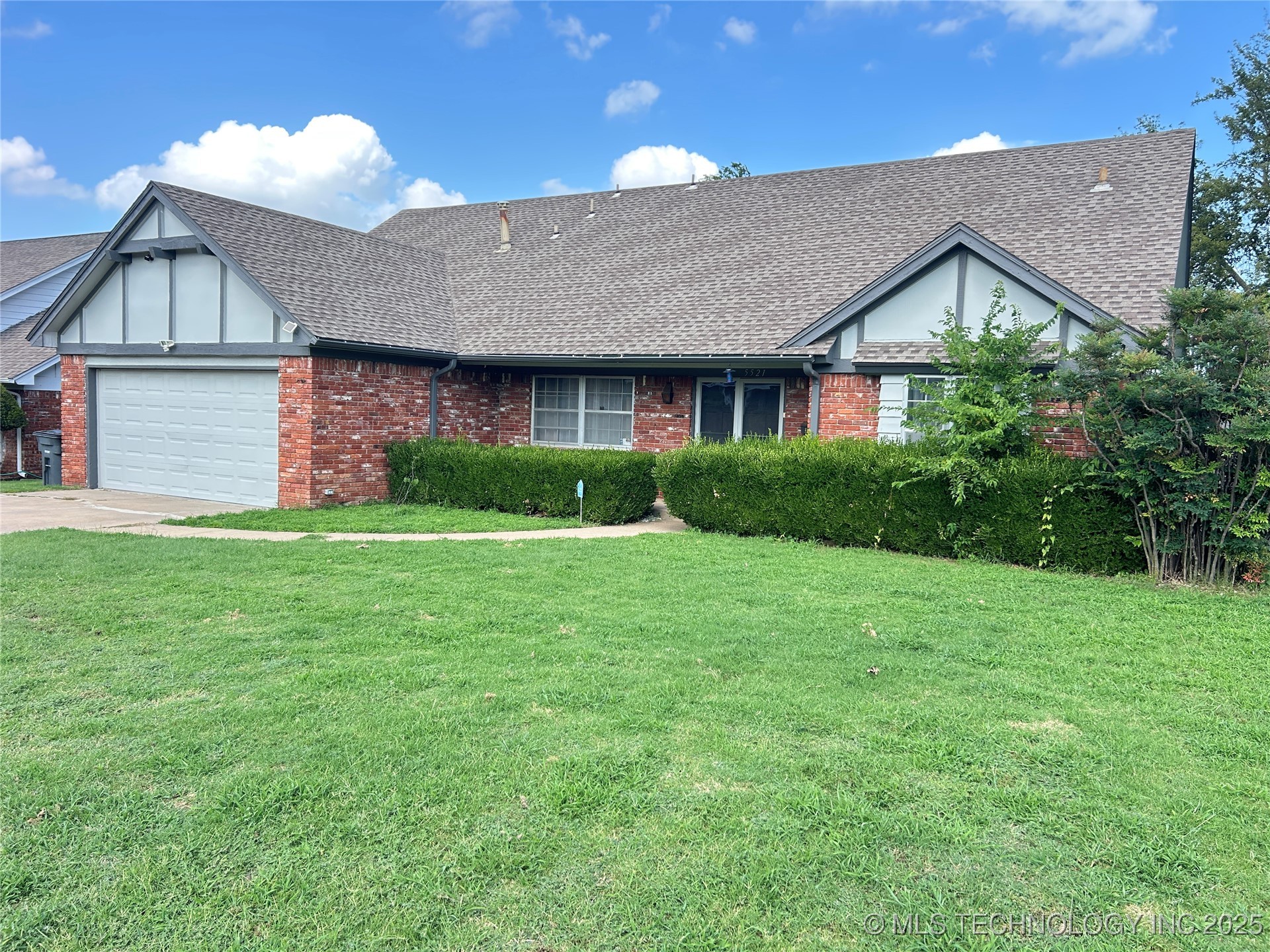 5521 S 76th East Avenue E Property Photo 1