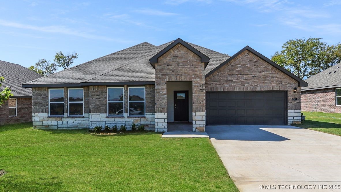 7512 N 154th East Avenue Property Photo 1