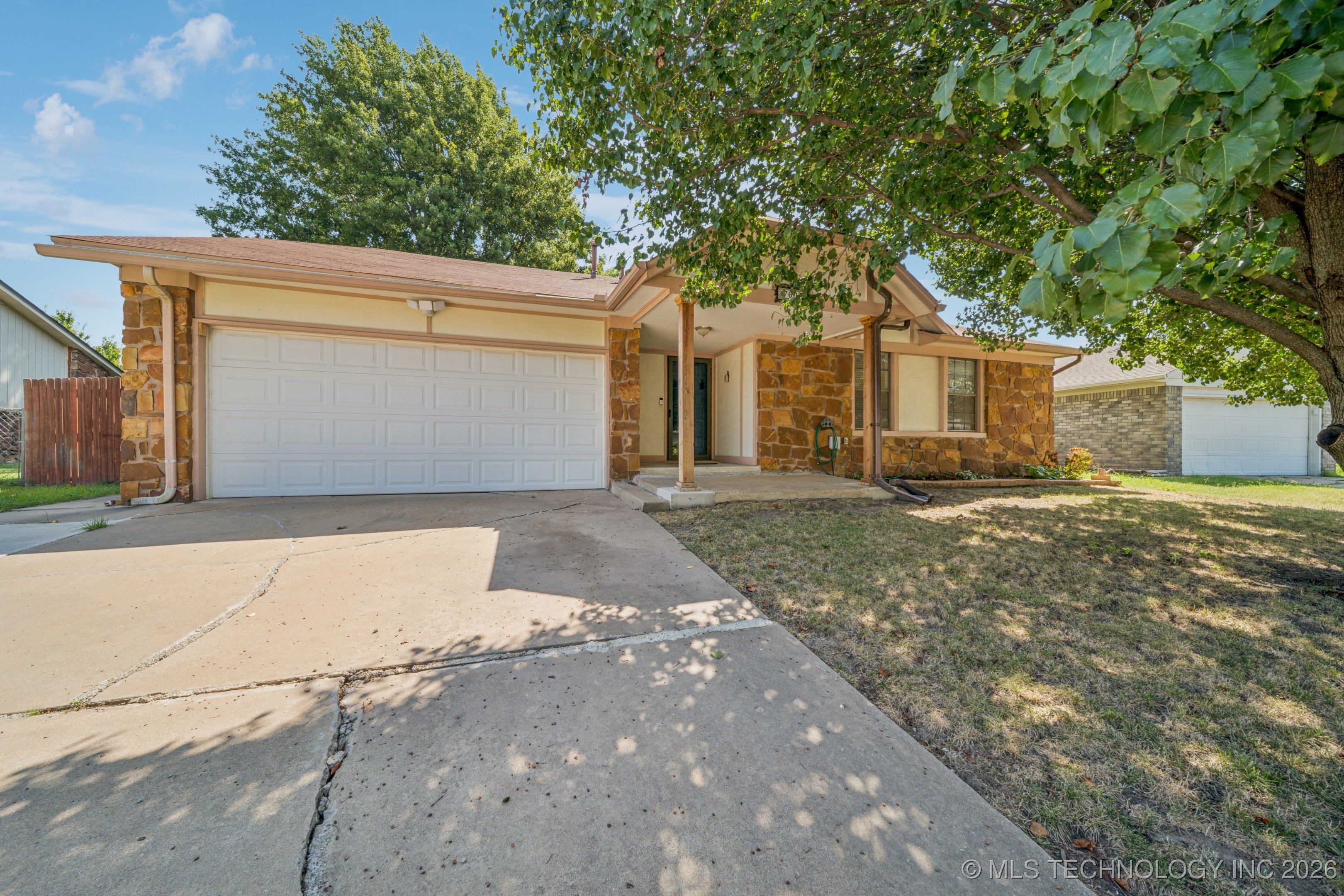 7607 N 122nd East Avenue Property Photo 1