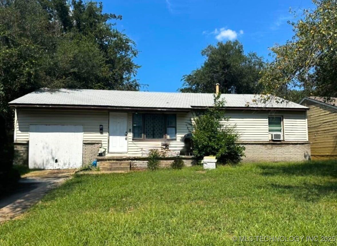 223 E 52nd Street N Property Photo 1