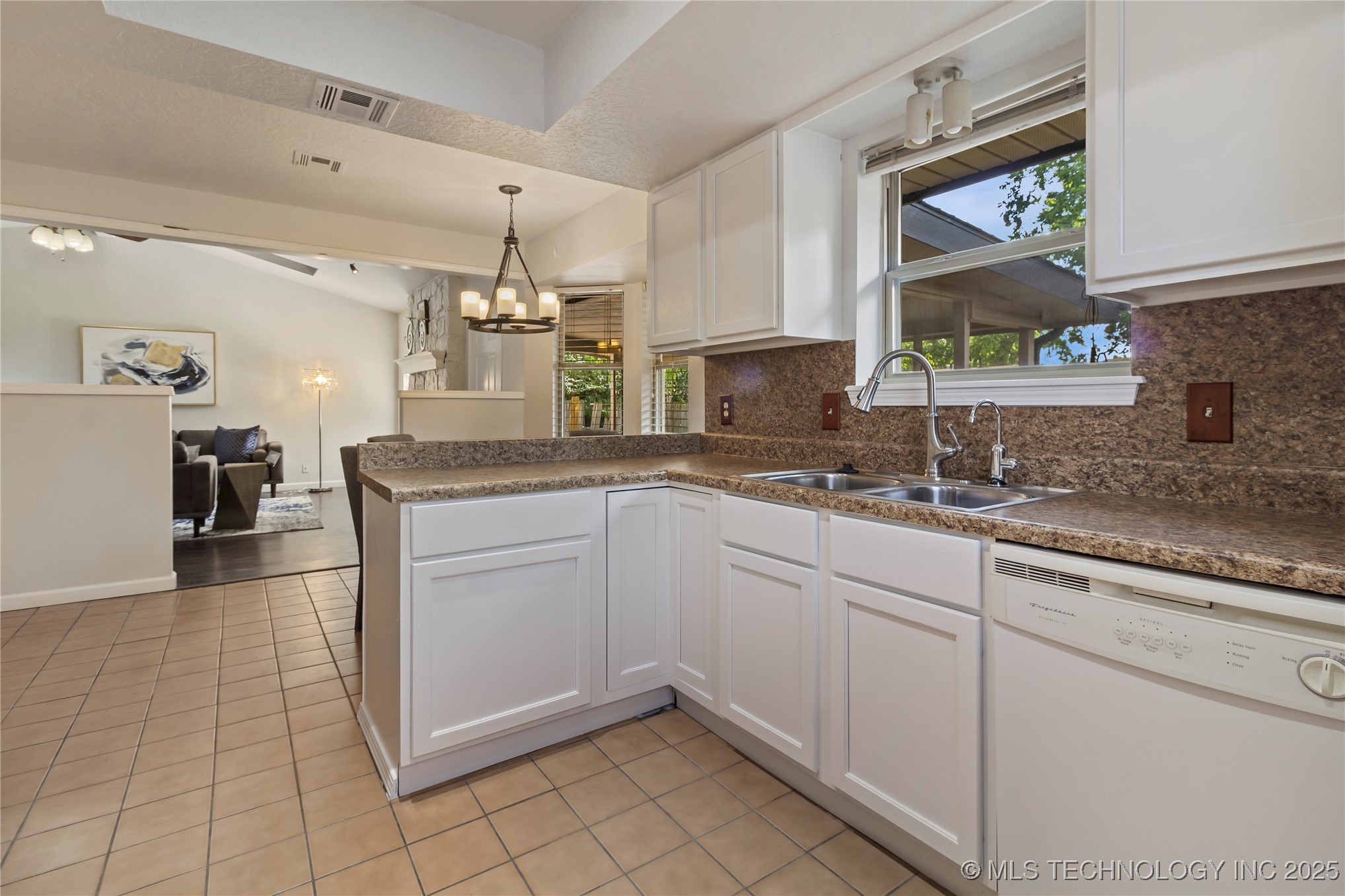 8214 N 122nd East Avenue Property Photo 8