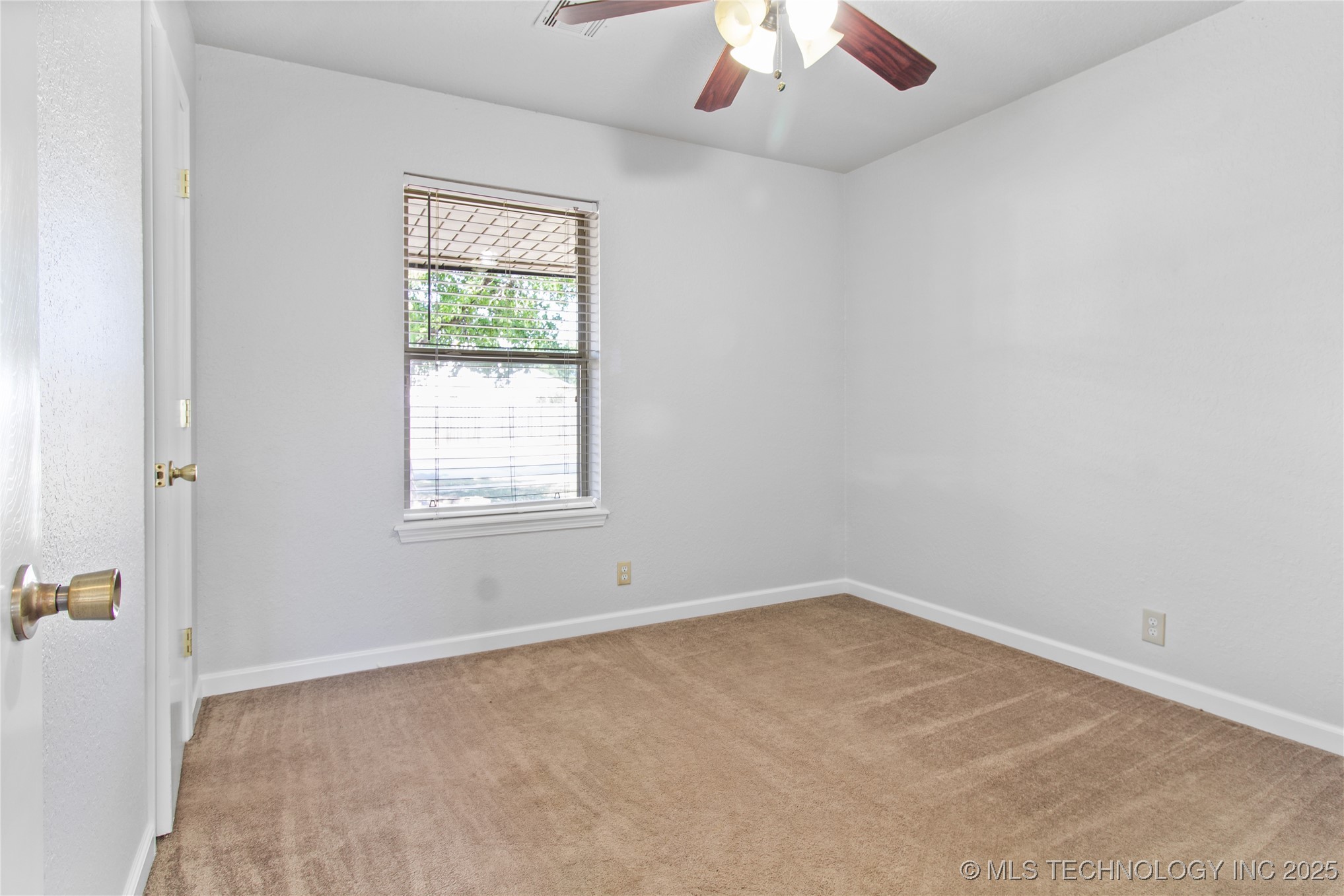 8214 N 122nd East Avenue Property Photo 13