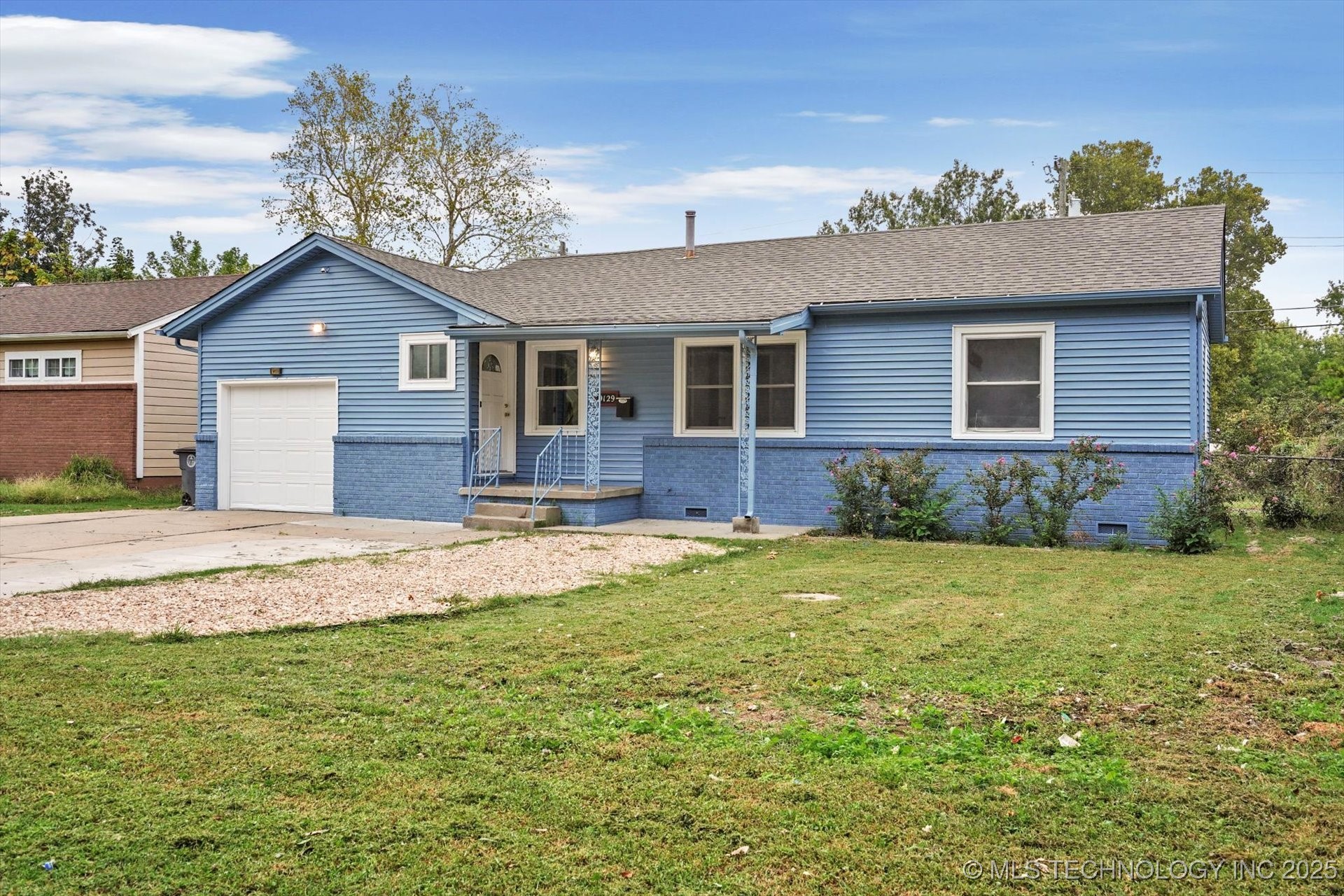 9129 E 3rd Place Property Photo 1