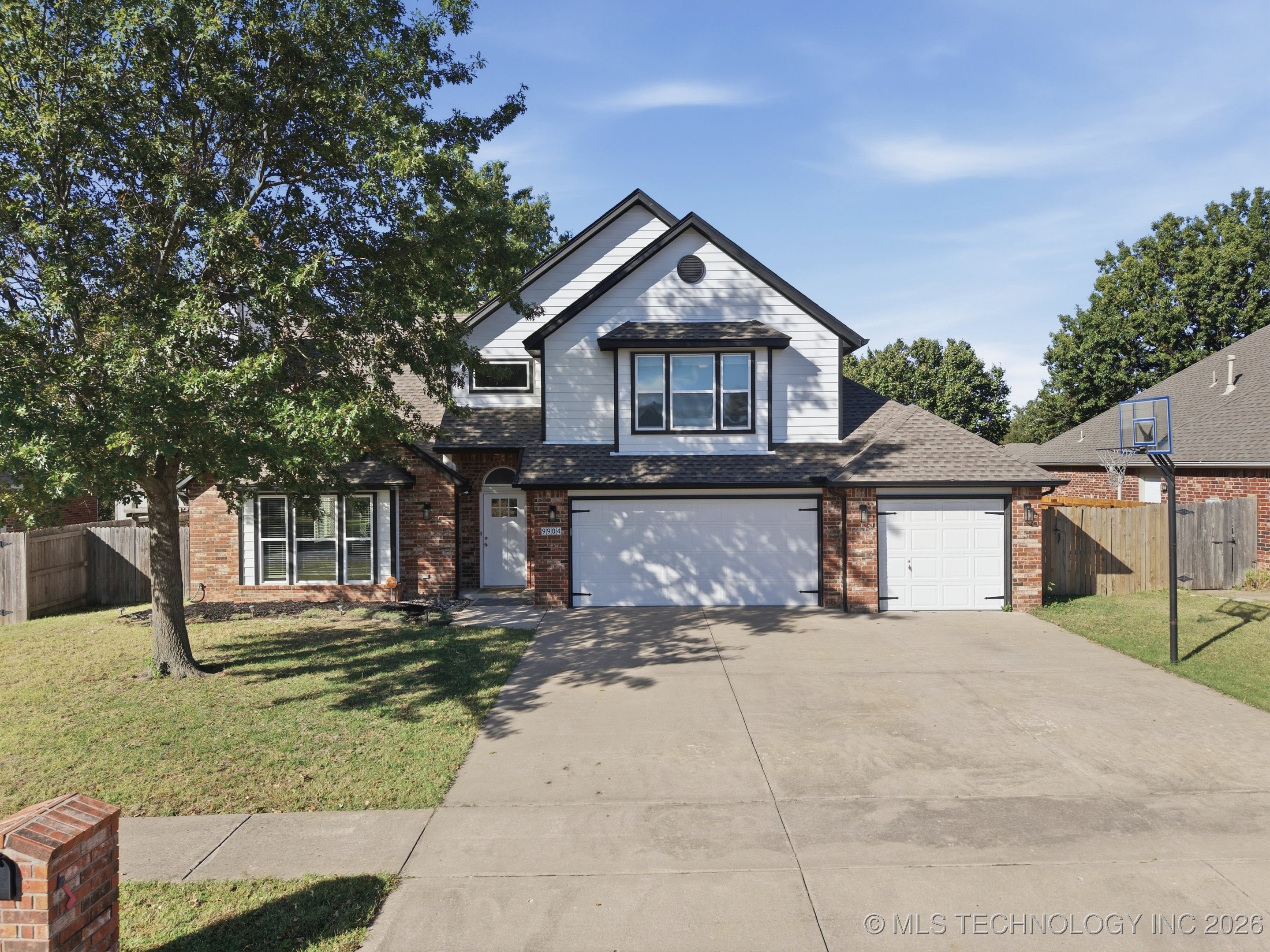 9904 N 117th East Avenue Property Photo 1