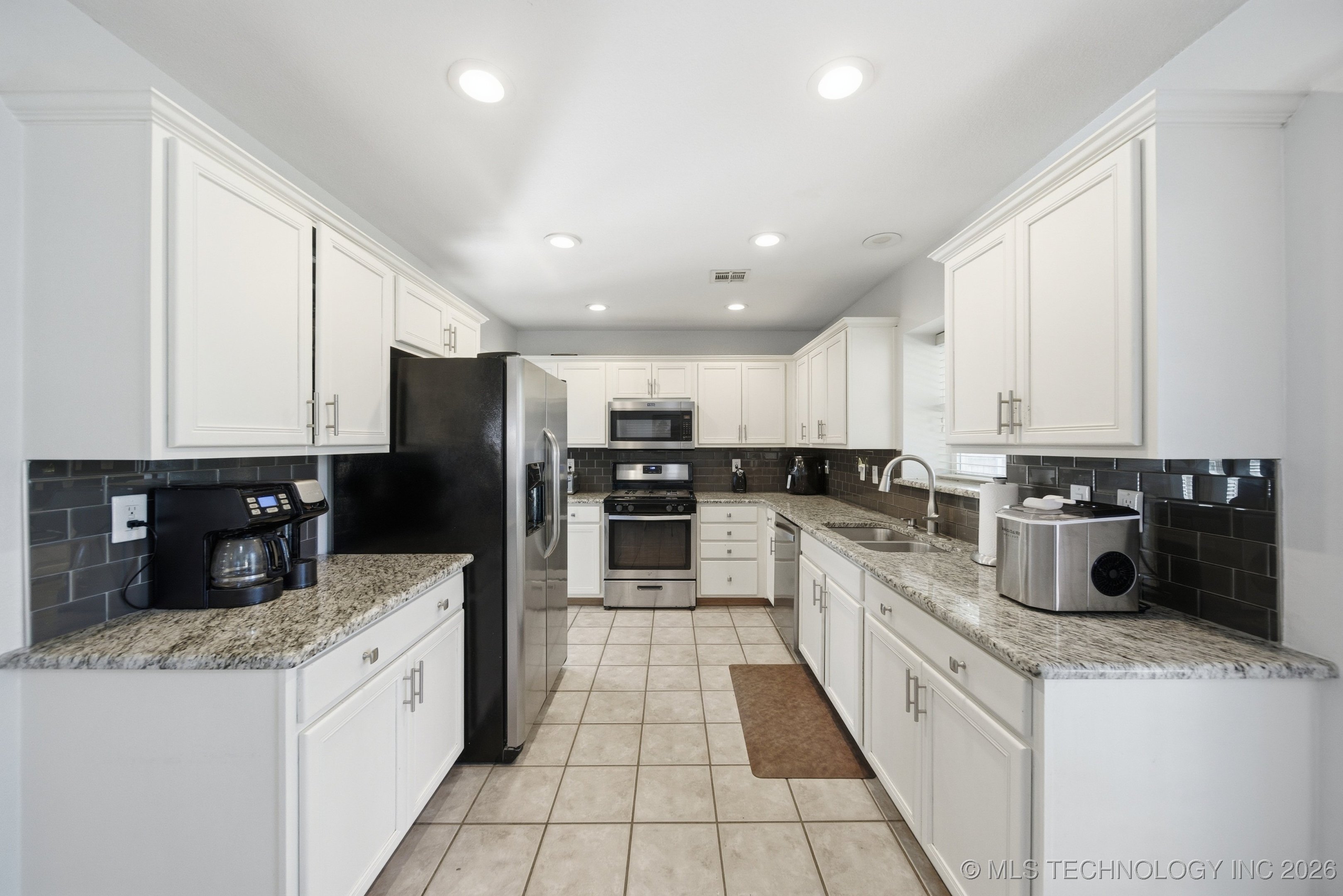 9904 N 117th East Avenue Property Photo 8