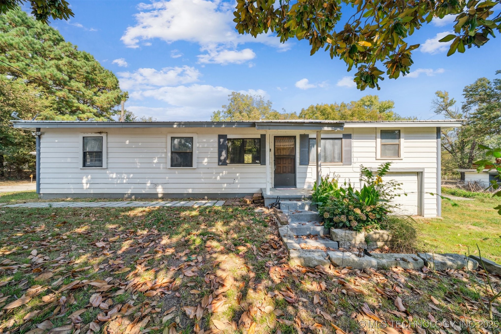 6122 E 83rd Street N Property Photo 1