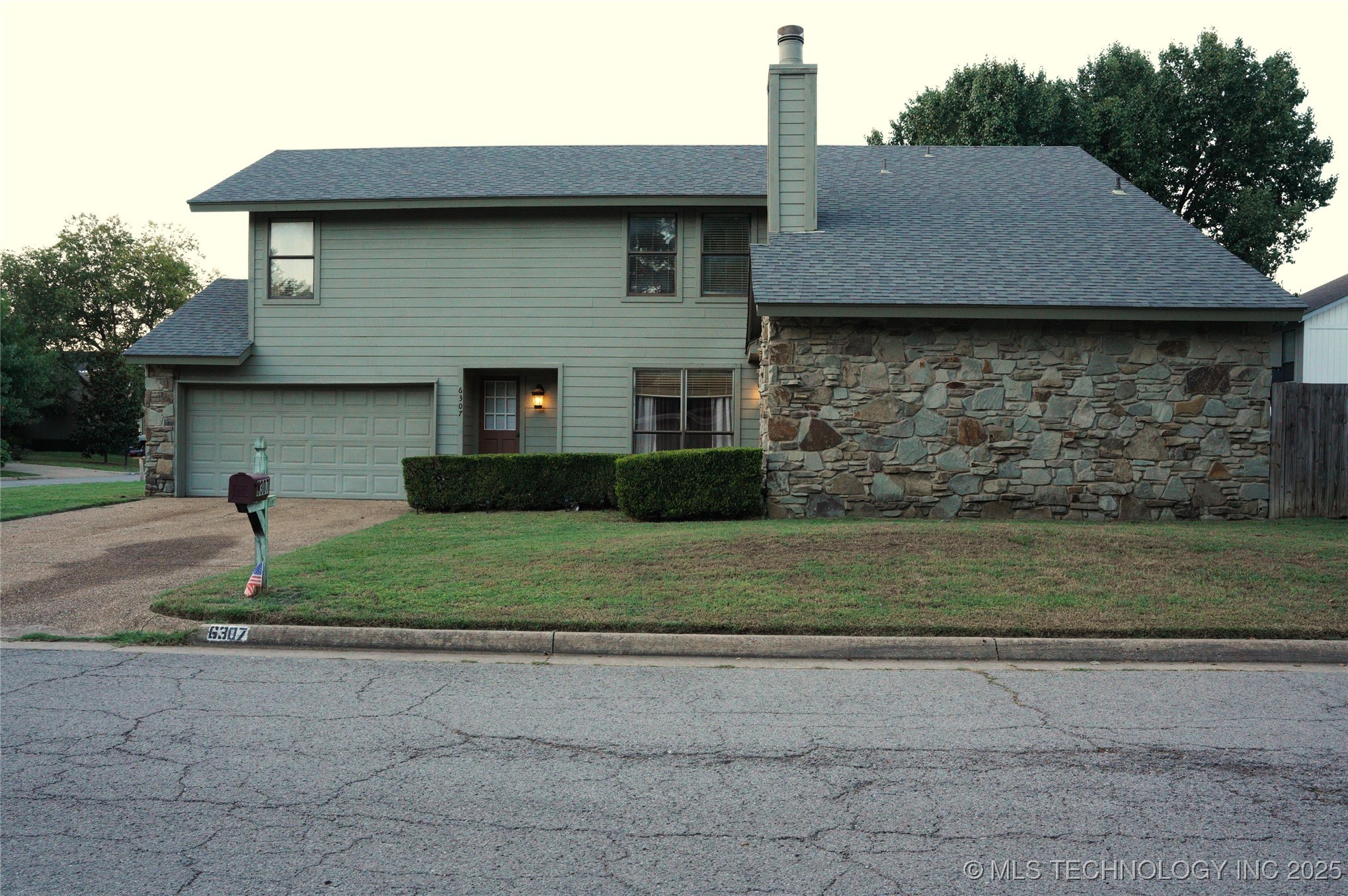 6307 E 94th Place Property Photo 2