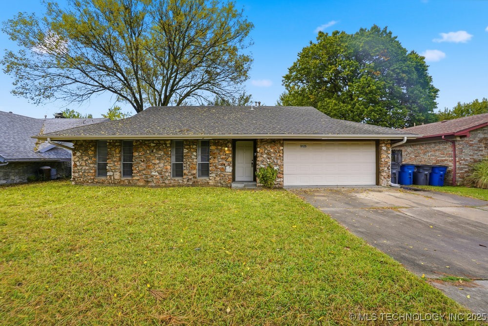 9125 E 49th Place Property Photo 1