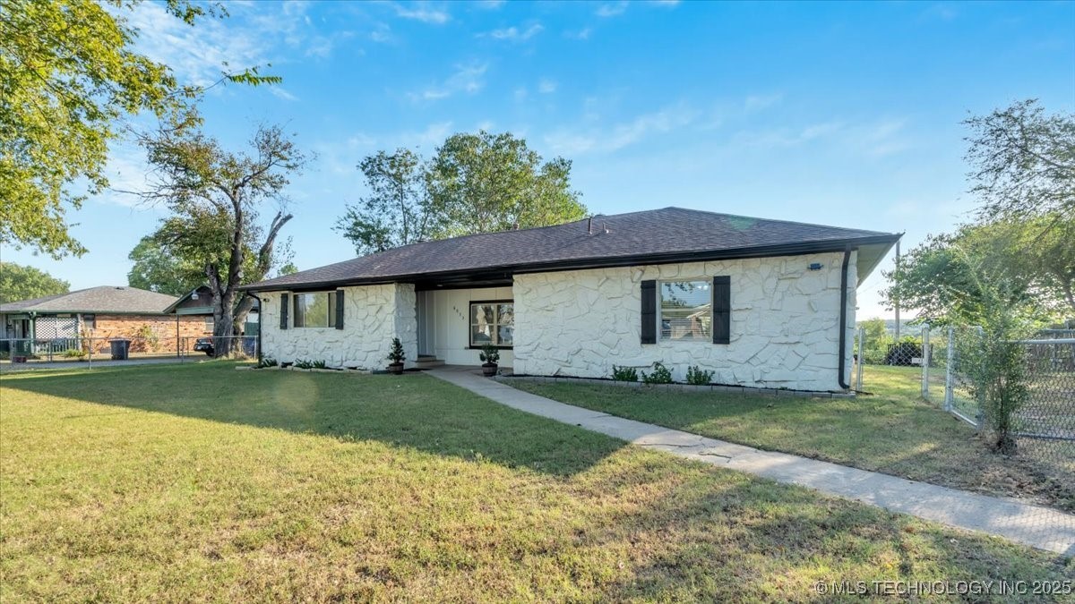 6033 S 31st West Avenue Property Photo 1