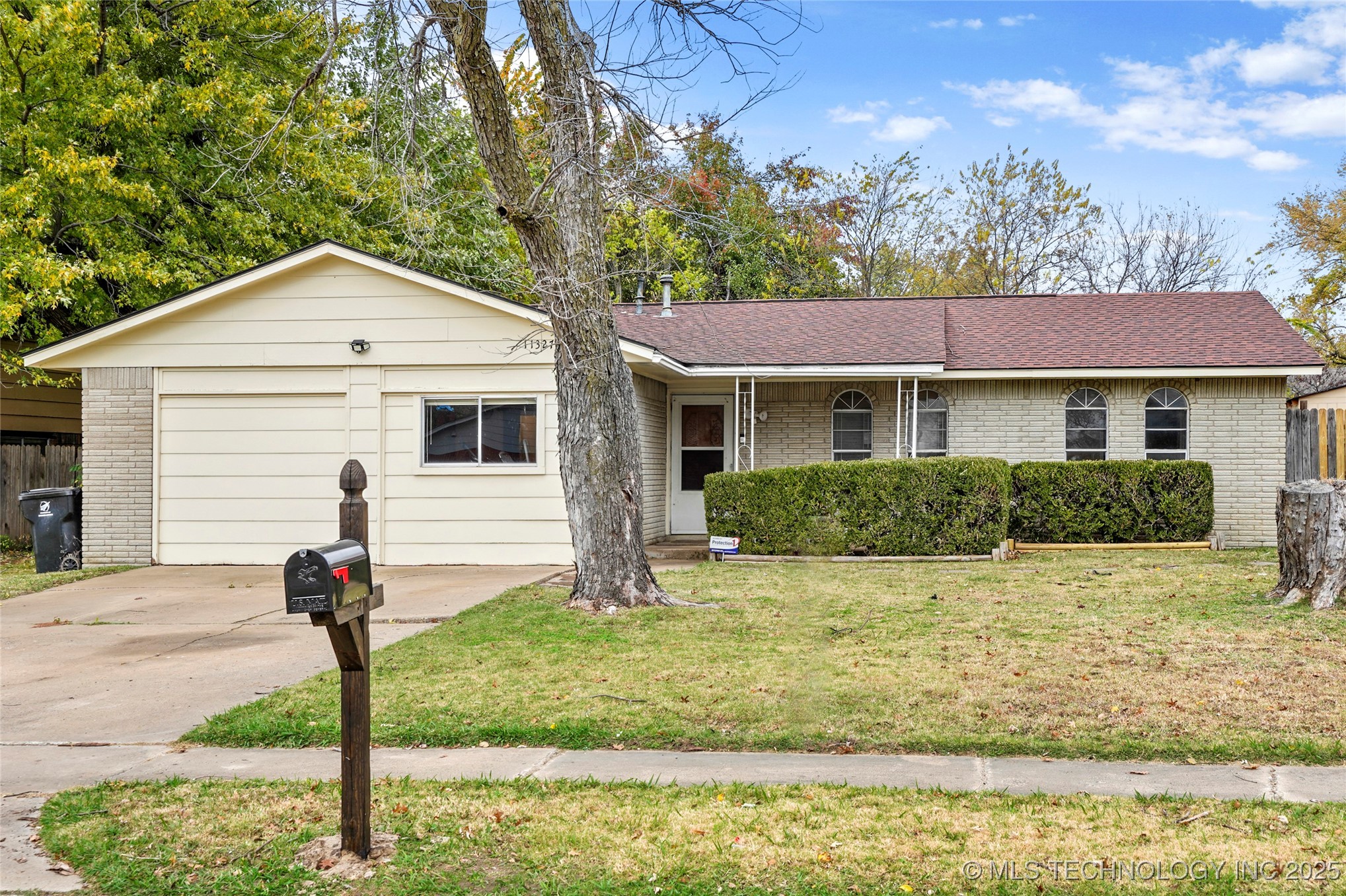 11327 E 63rd Street S Property Photo 1