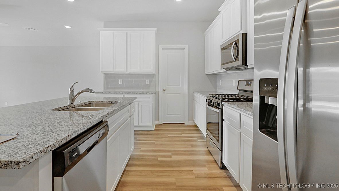 7020 E 154th Street S Property Photo 5