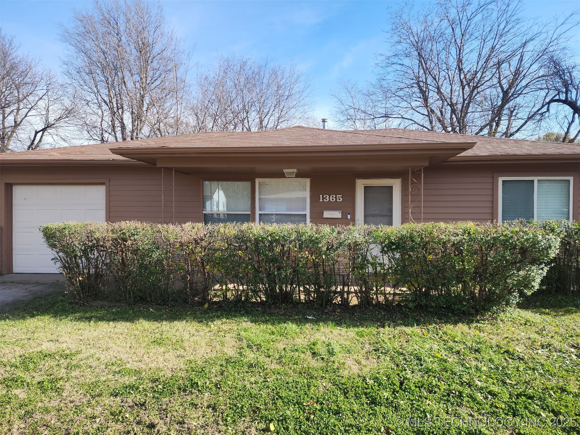 1365 N 76th East Avenue Property Photo 1