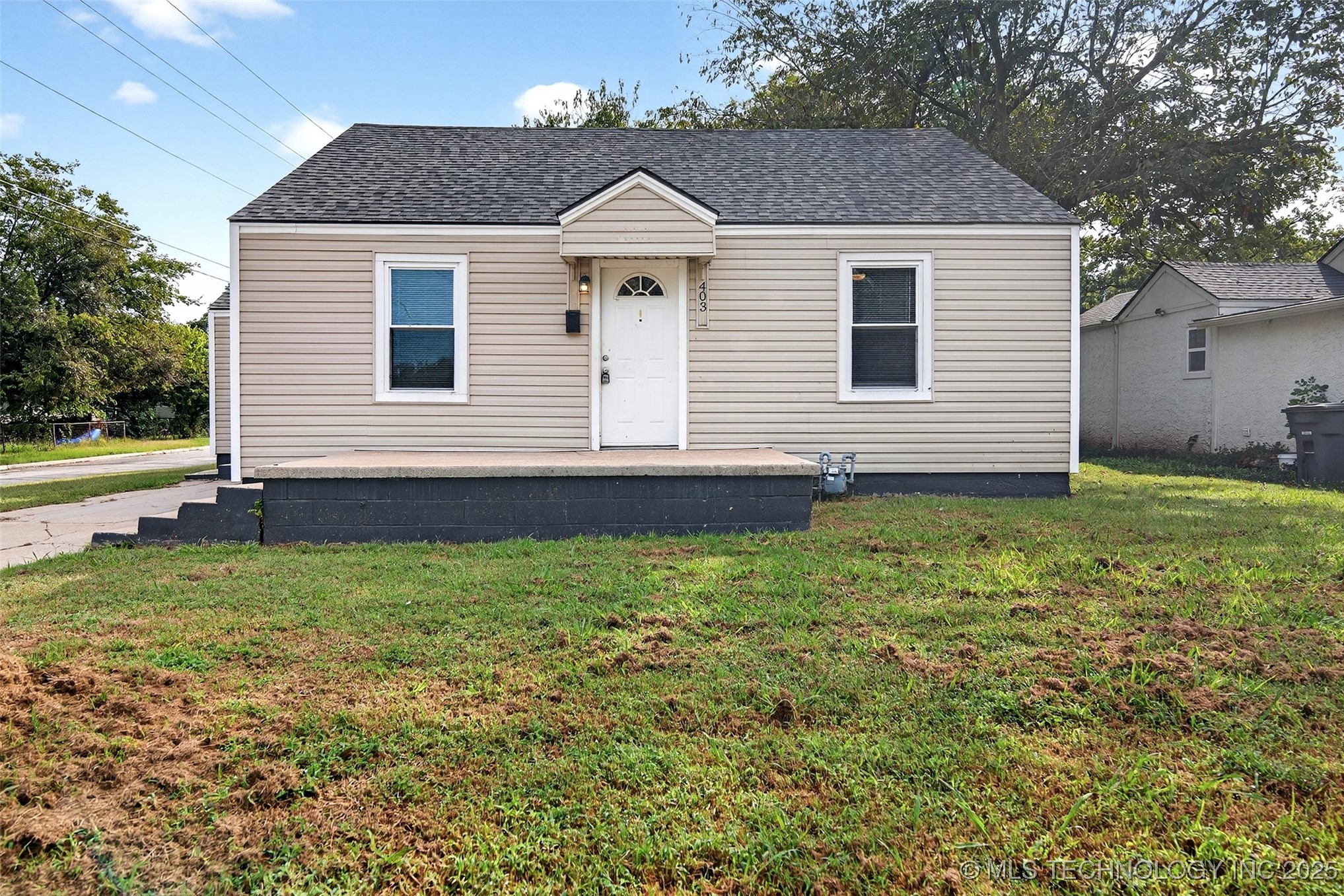 403 S 72nd East Avenue Property Photo 1