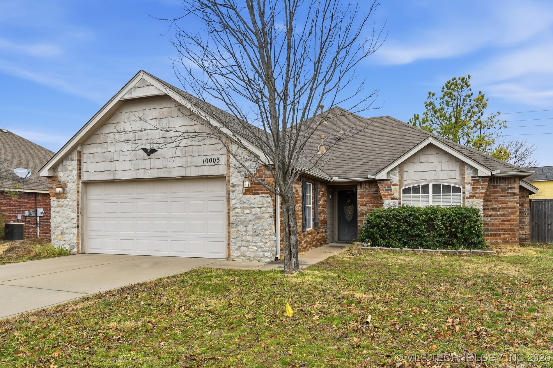 10003 N 103rd East Avenue Property Photo 1