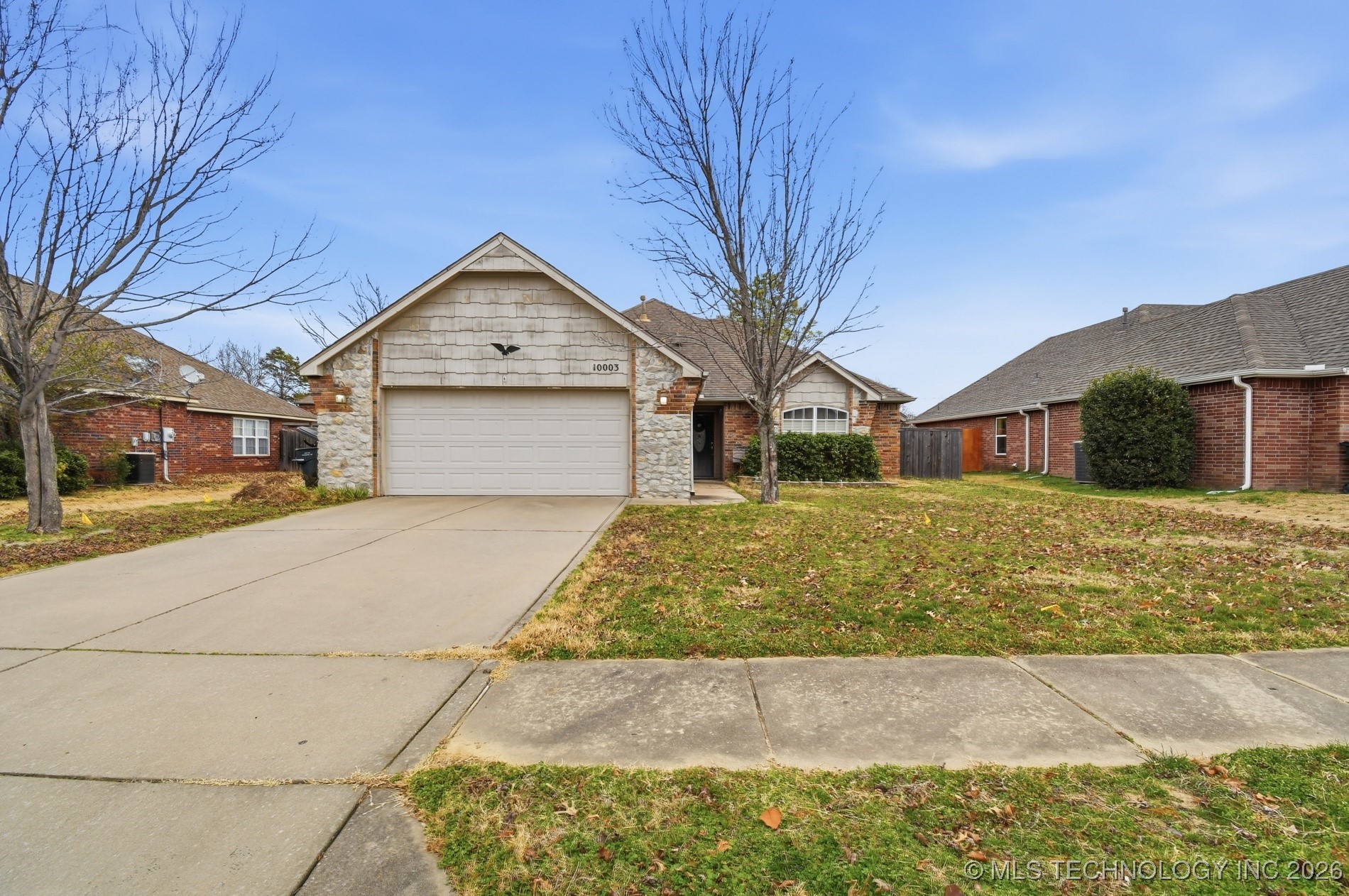 10003 N 103rd East Avenue Property Photo 3