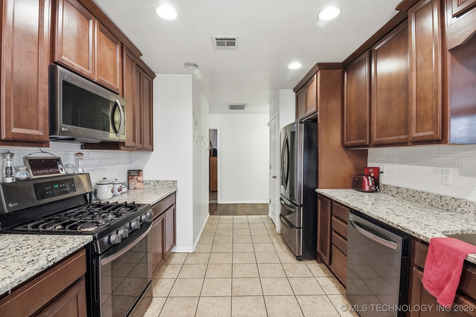 10003 N 103rd East Avenue Property Photo 10