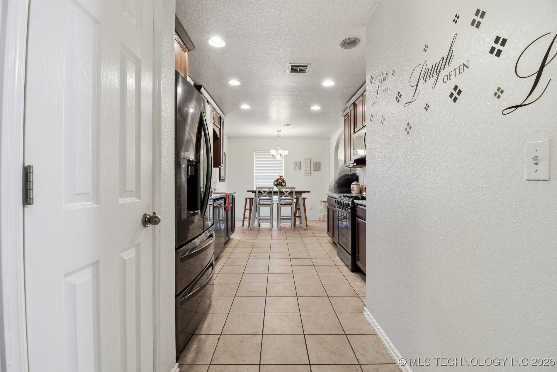 10003 N 103rd East Avenue Property Photo 13