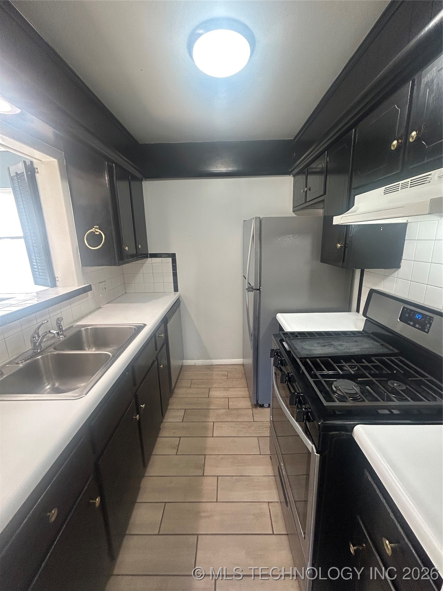 4909 S Utica Avenue D Property Photo 6