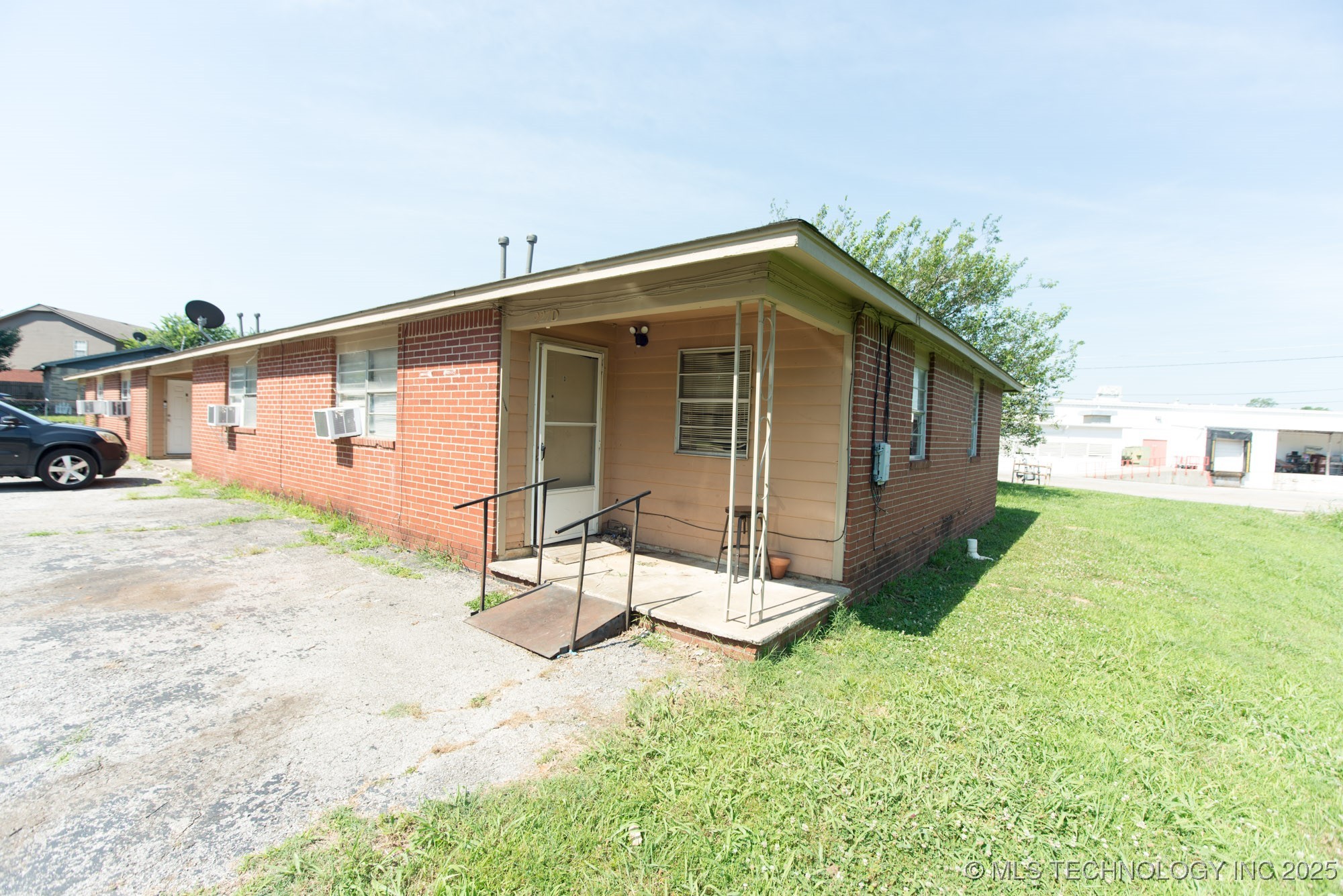 13858 S 292nd East Avenue D Property Photo 1