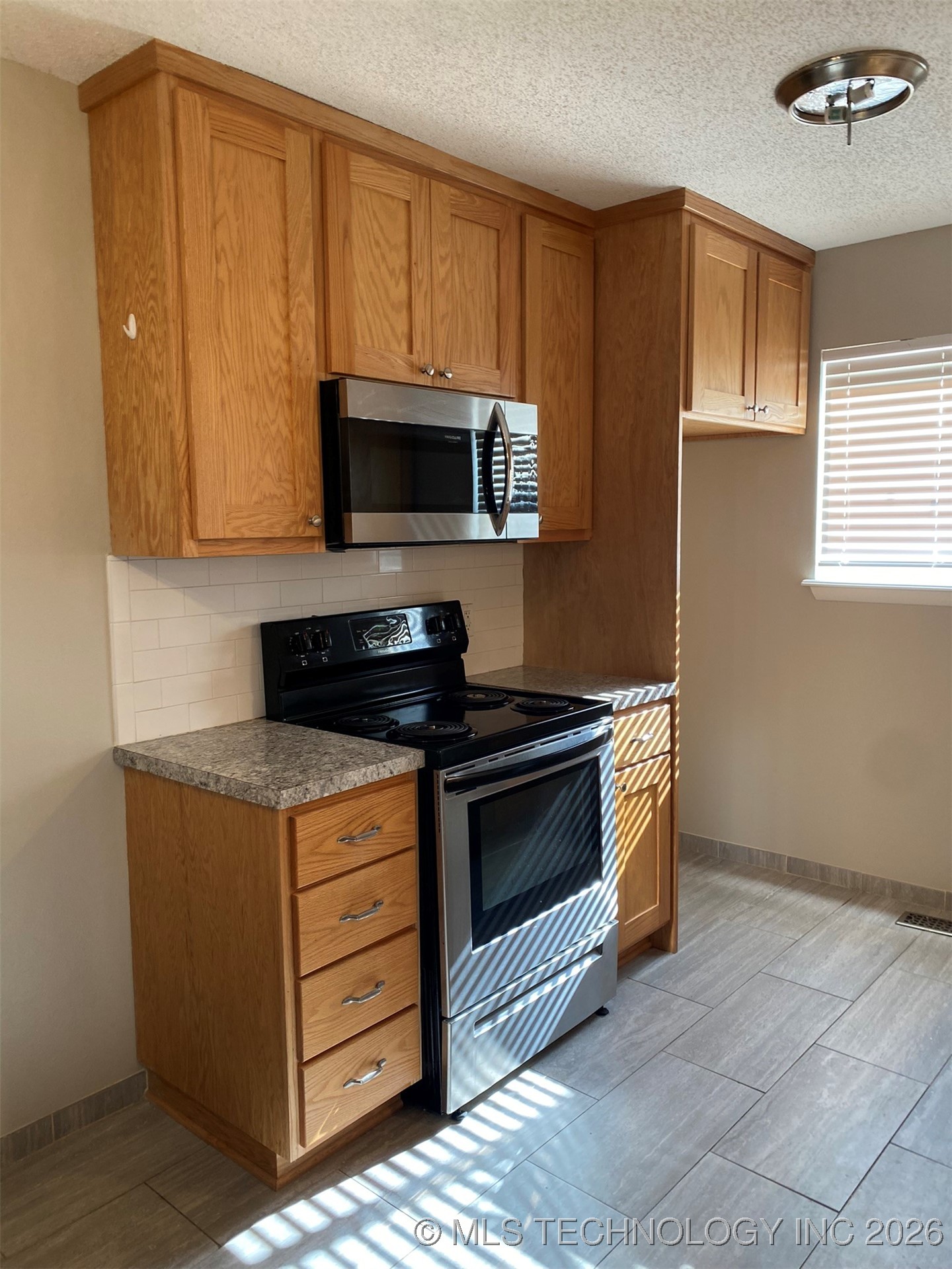 6347 S Madison Place Property Photo 7