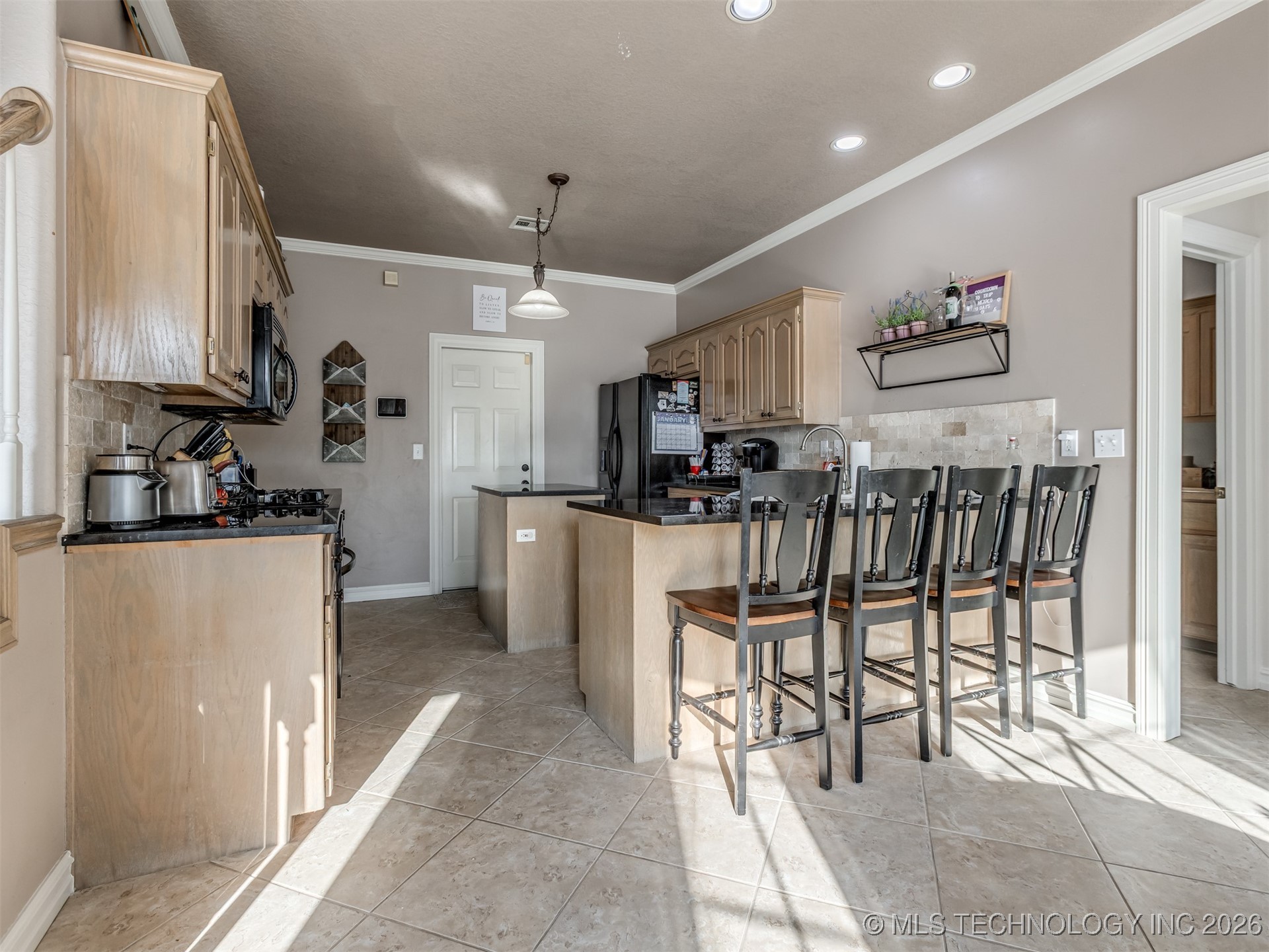 9109 N 102nd East Avenue Property Photo 13