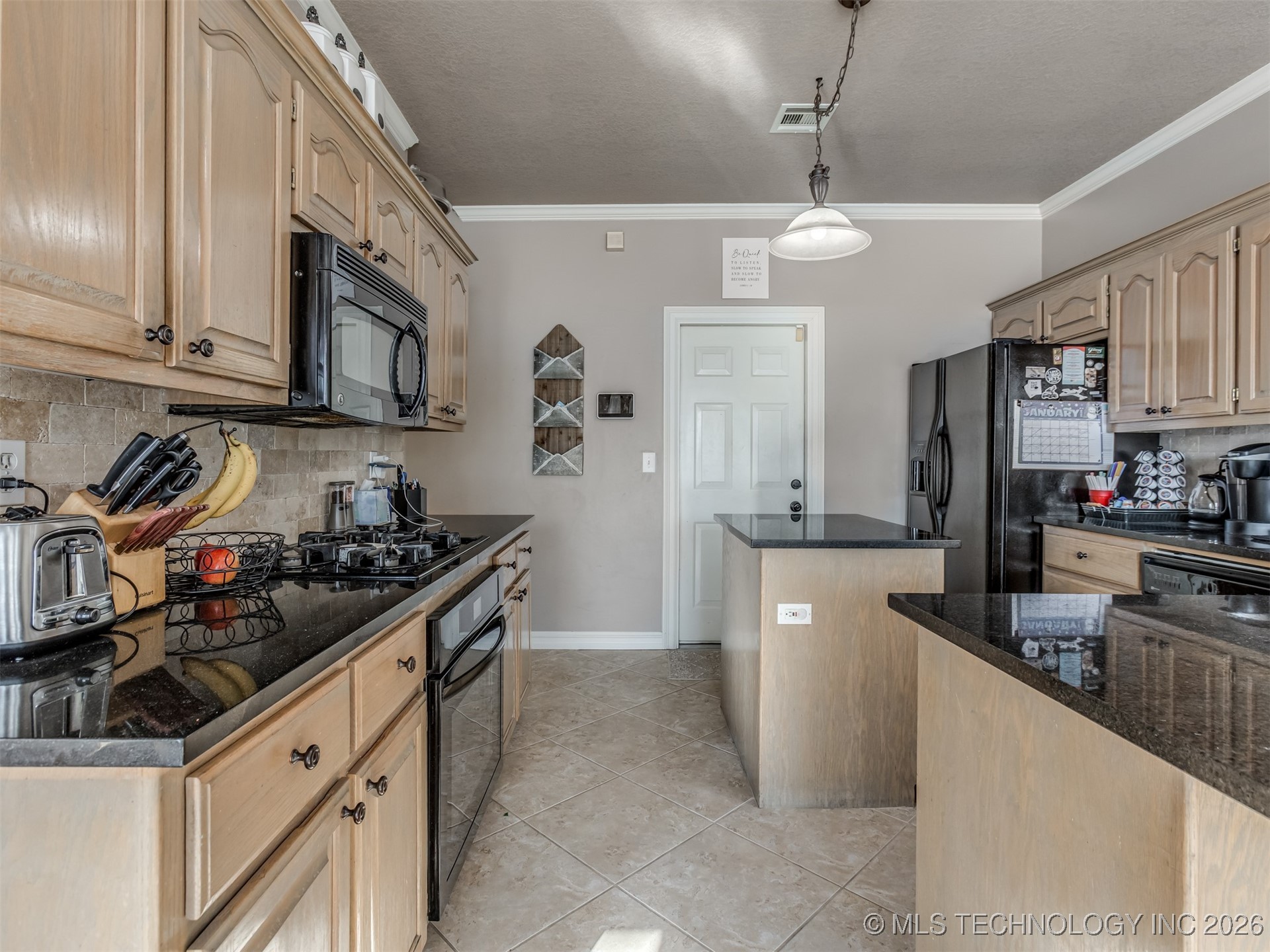 9109 N 102nd East Avenue Property Photo 15