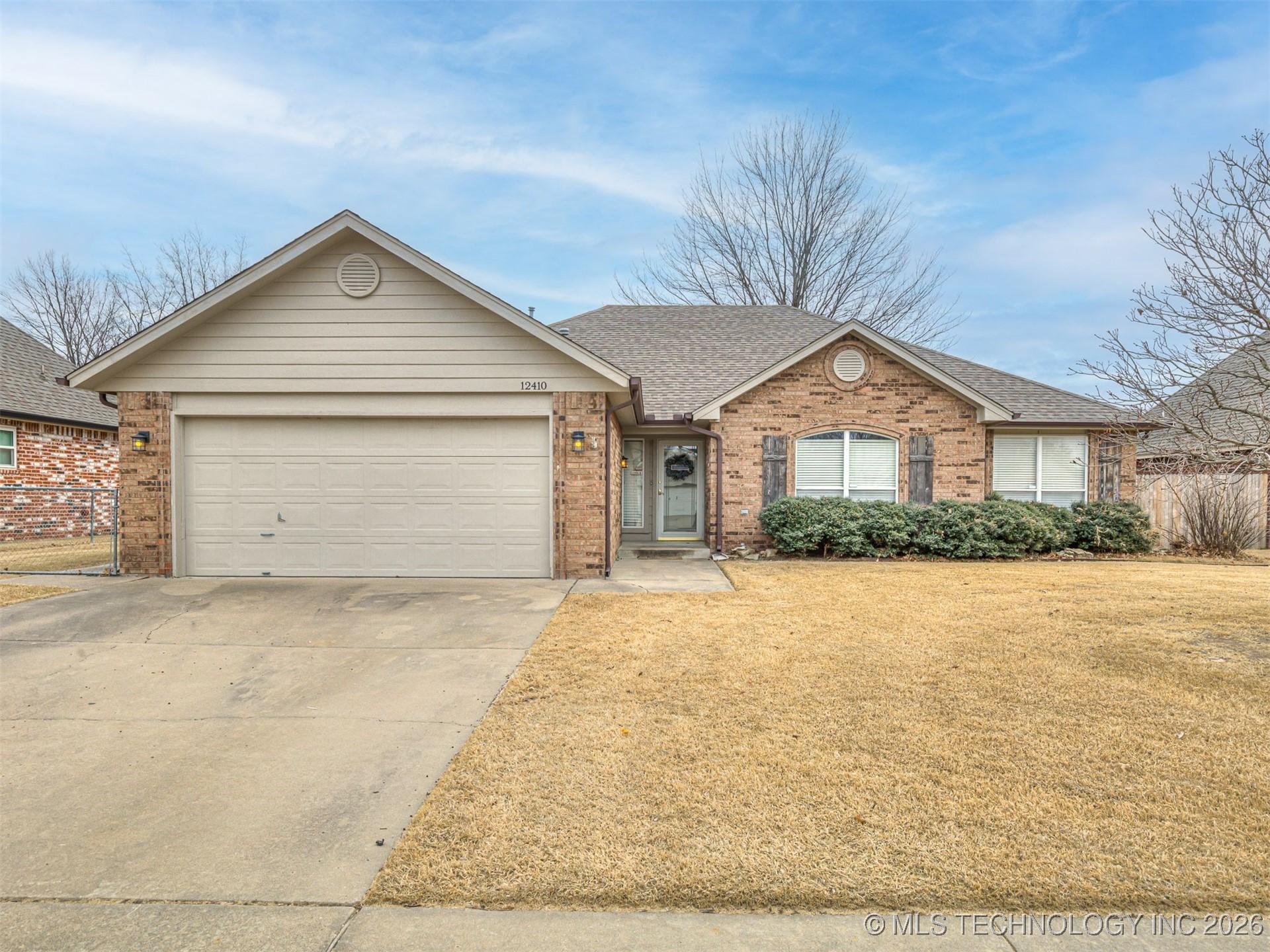 12410 E 80th Court North Property Photo 1