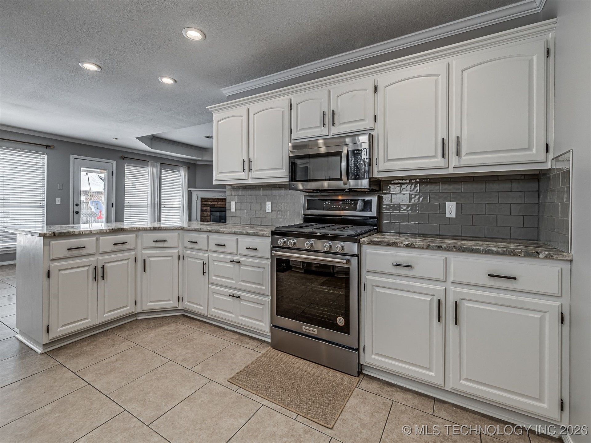 12410 E 80th Court North Property Photo 4