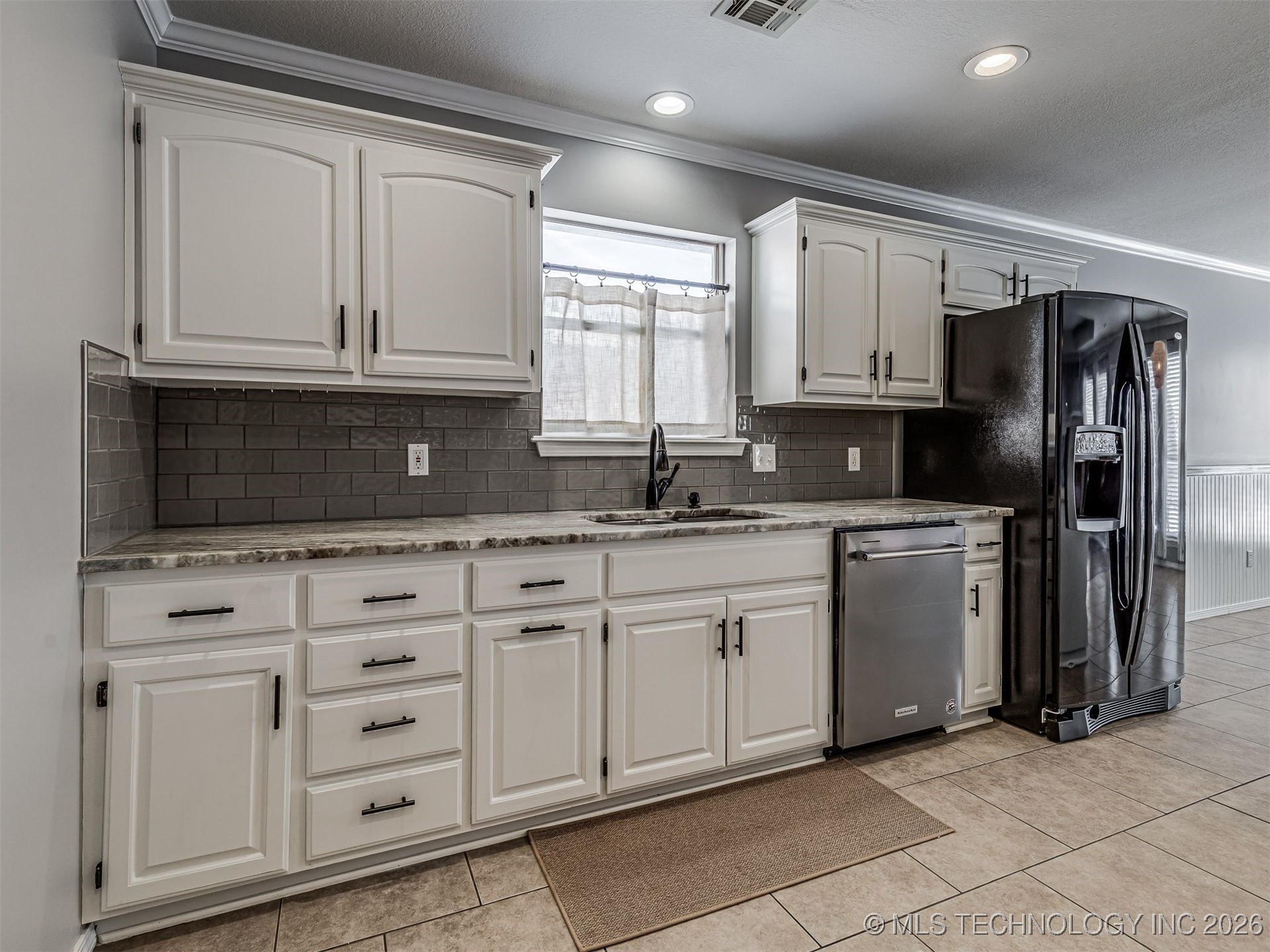 12410 E 80th Court North Property Photo 14