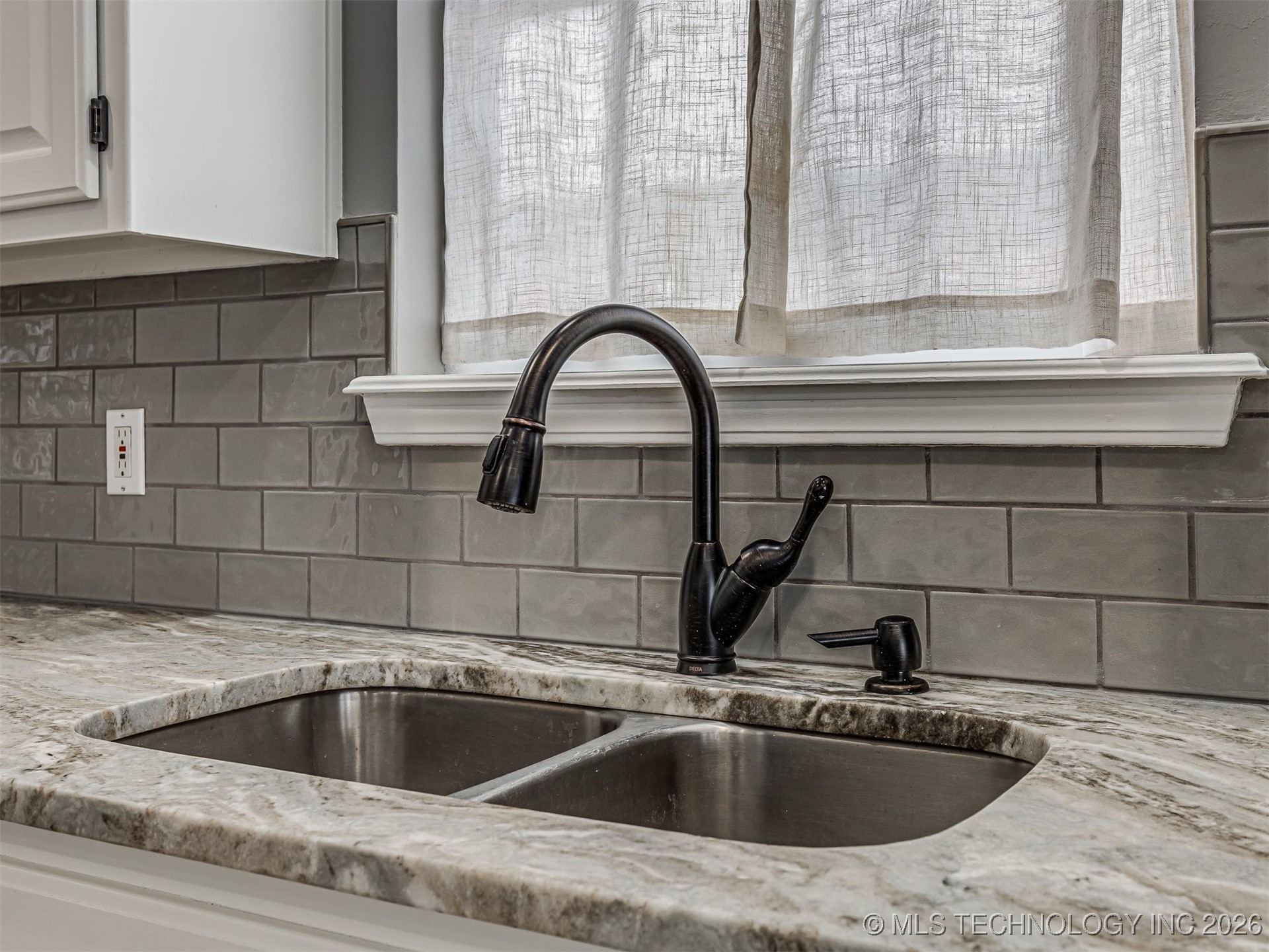 12410 E 80th Court North Property Photo 15