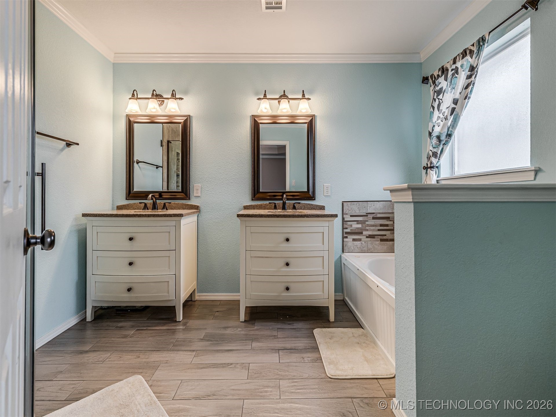 12410 E 80th Court North Property Photo 24