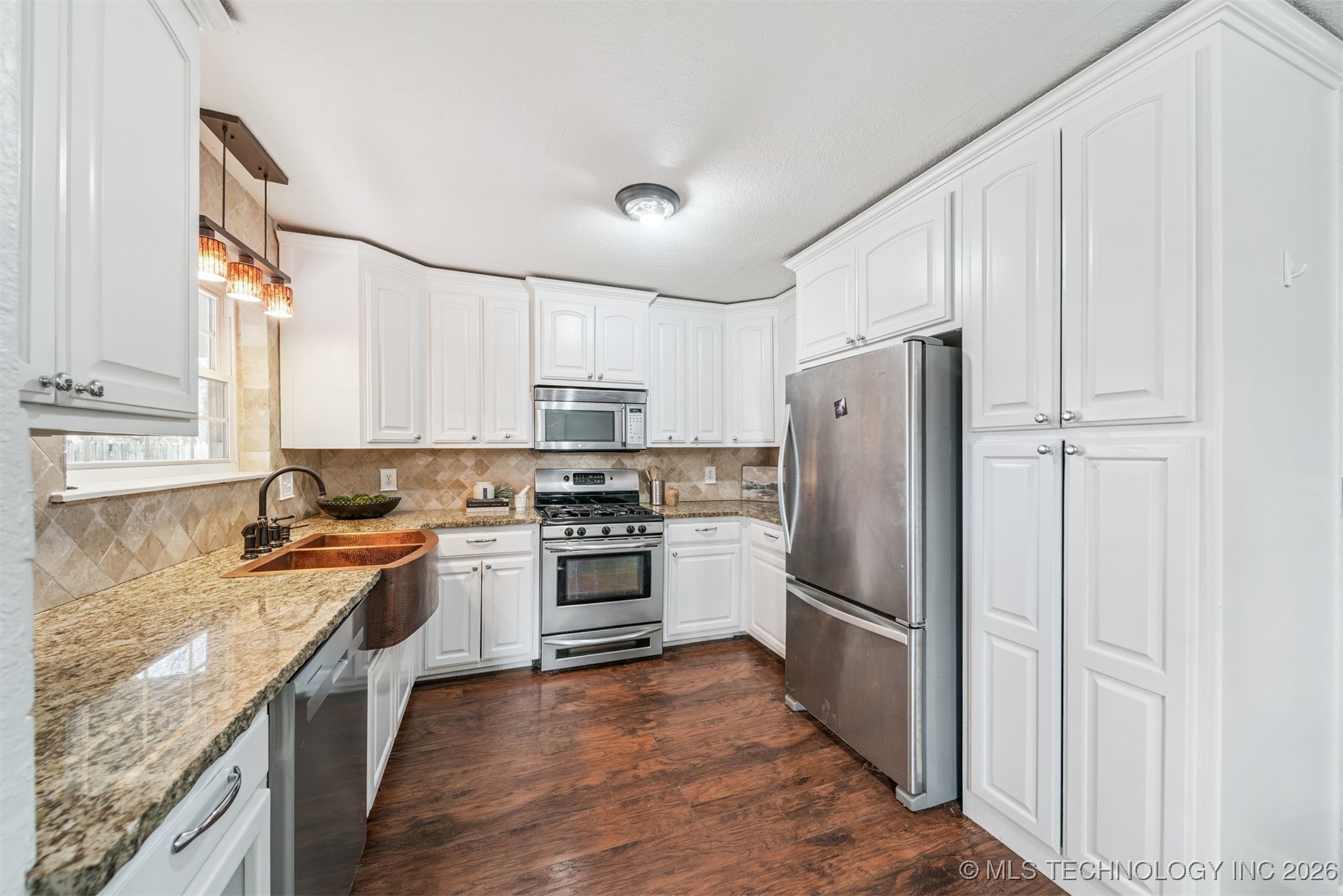 7710 N 132nd East Avenue Property Photo 11