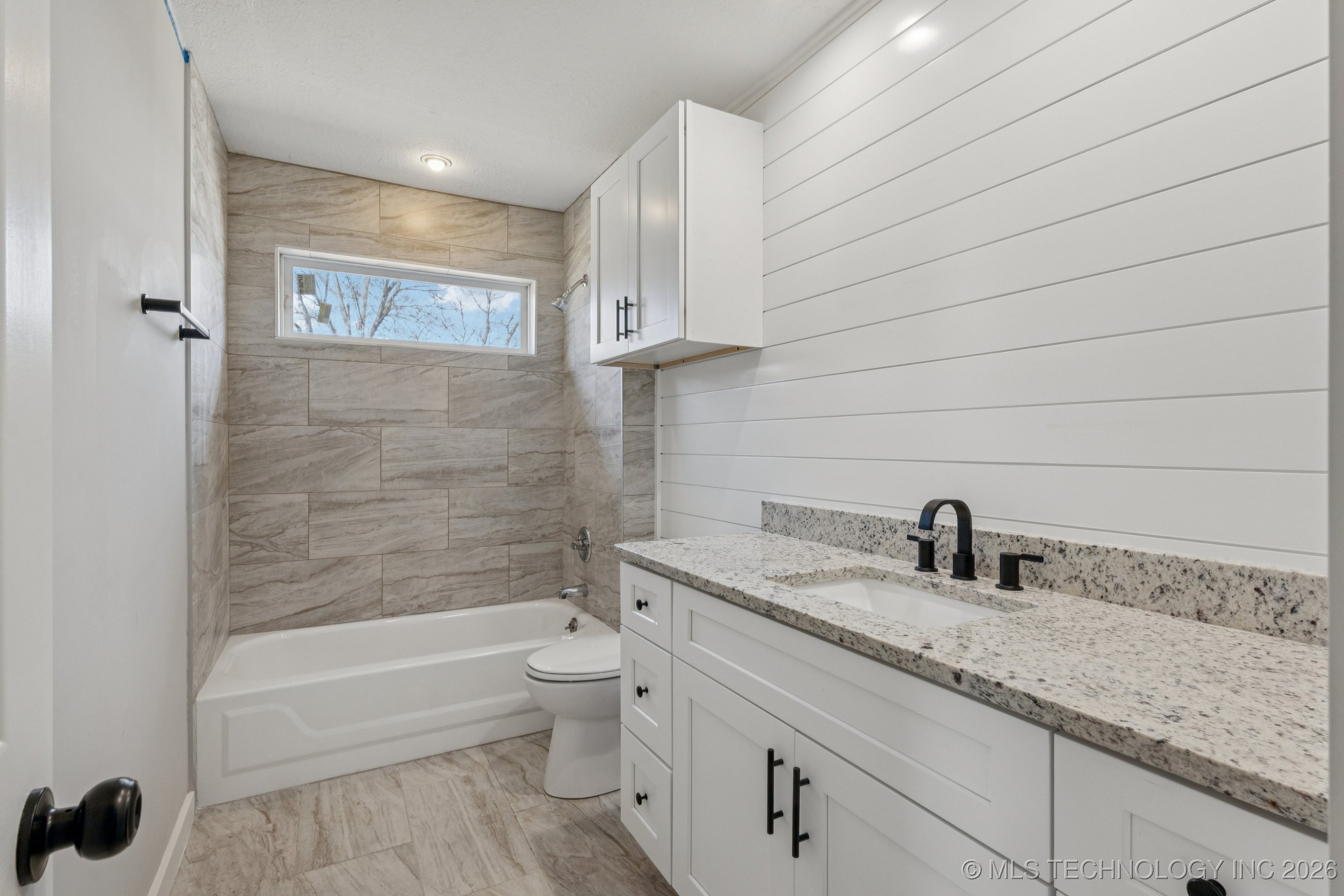 1228 S 76th East Avenue Property Photo 15