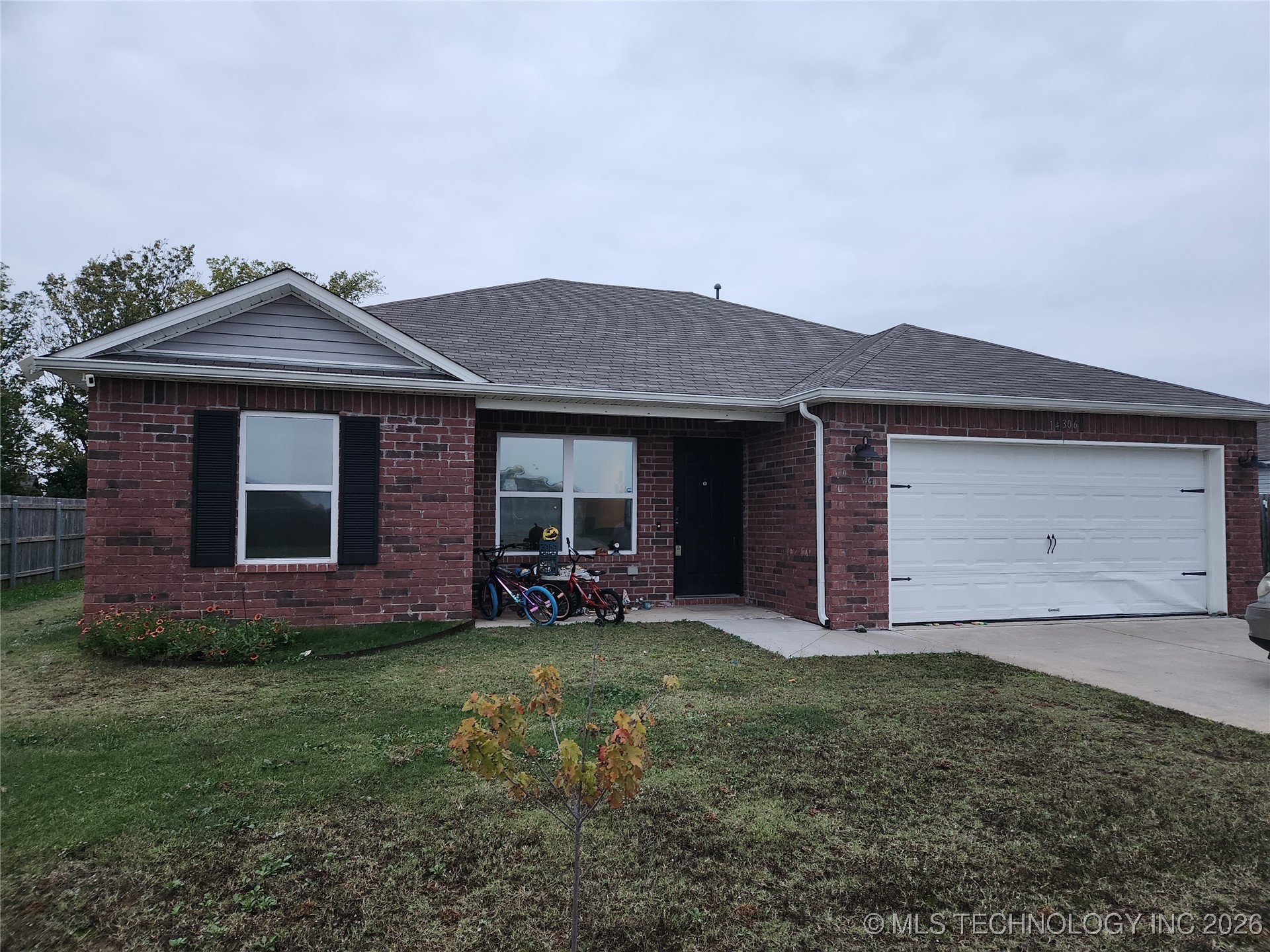 14306 N 73rd East Avenue Property Photo 1