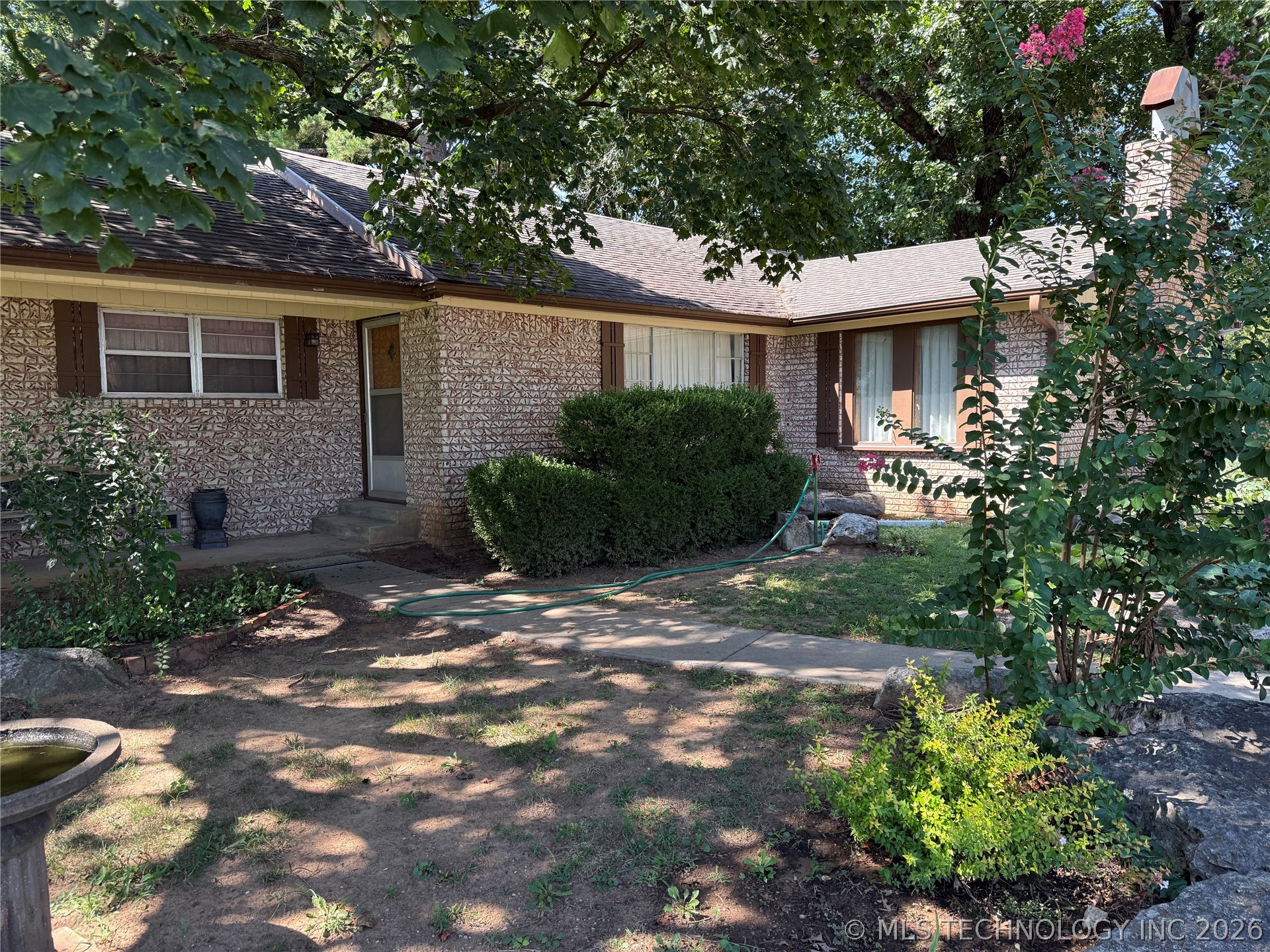 11716 E 69th Street North Property Photo 1
