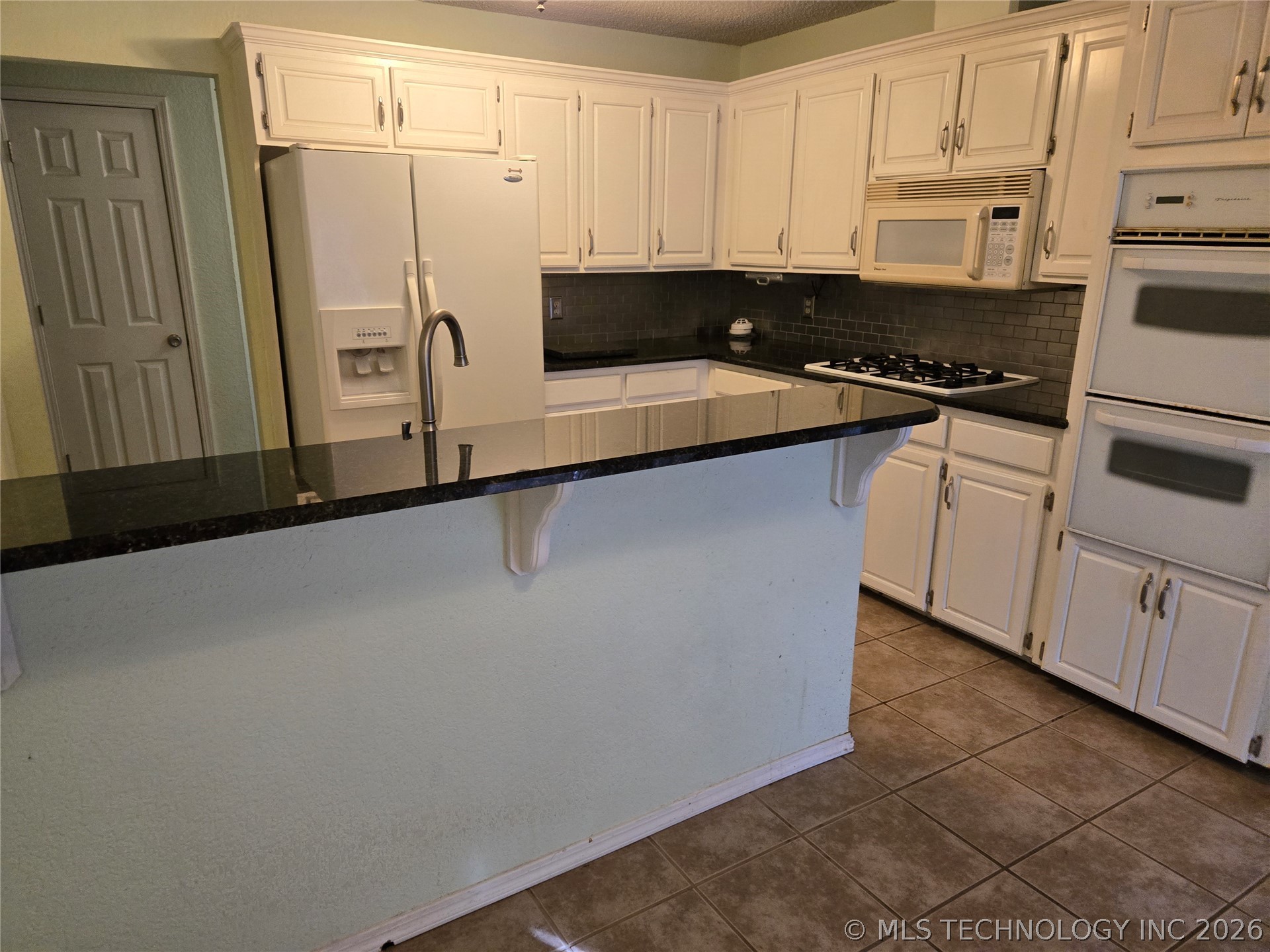 7804 N 117th East East Avenue Property Photo 20