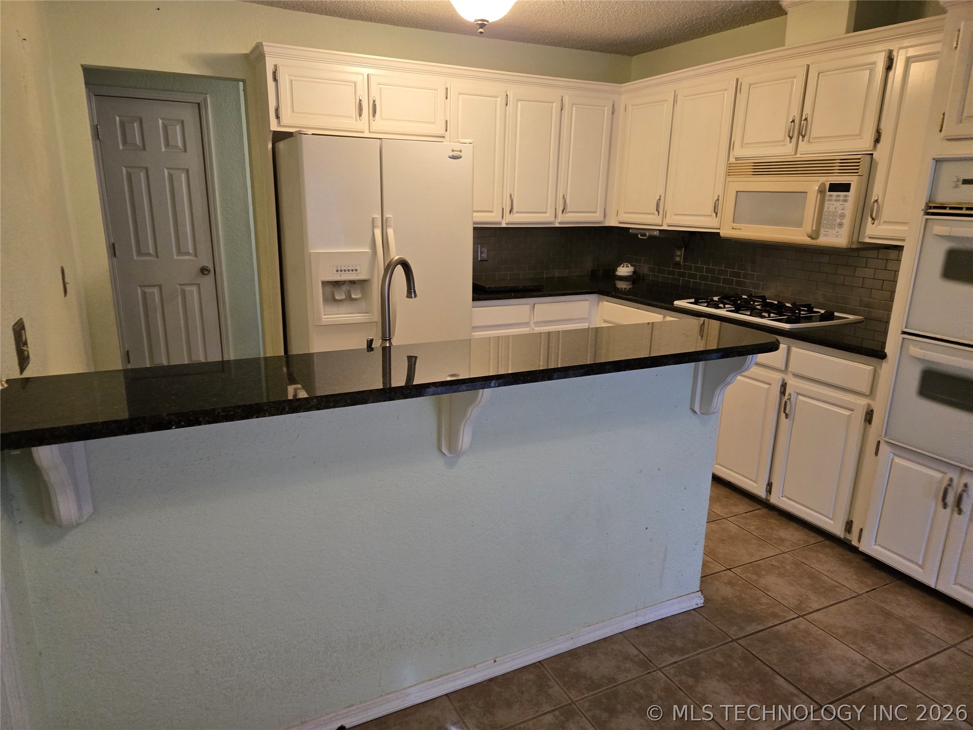 7804 N 117th East East Avenue Property Photo 23