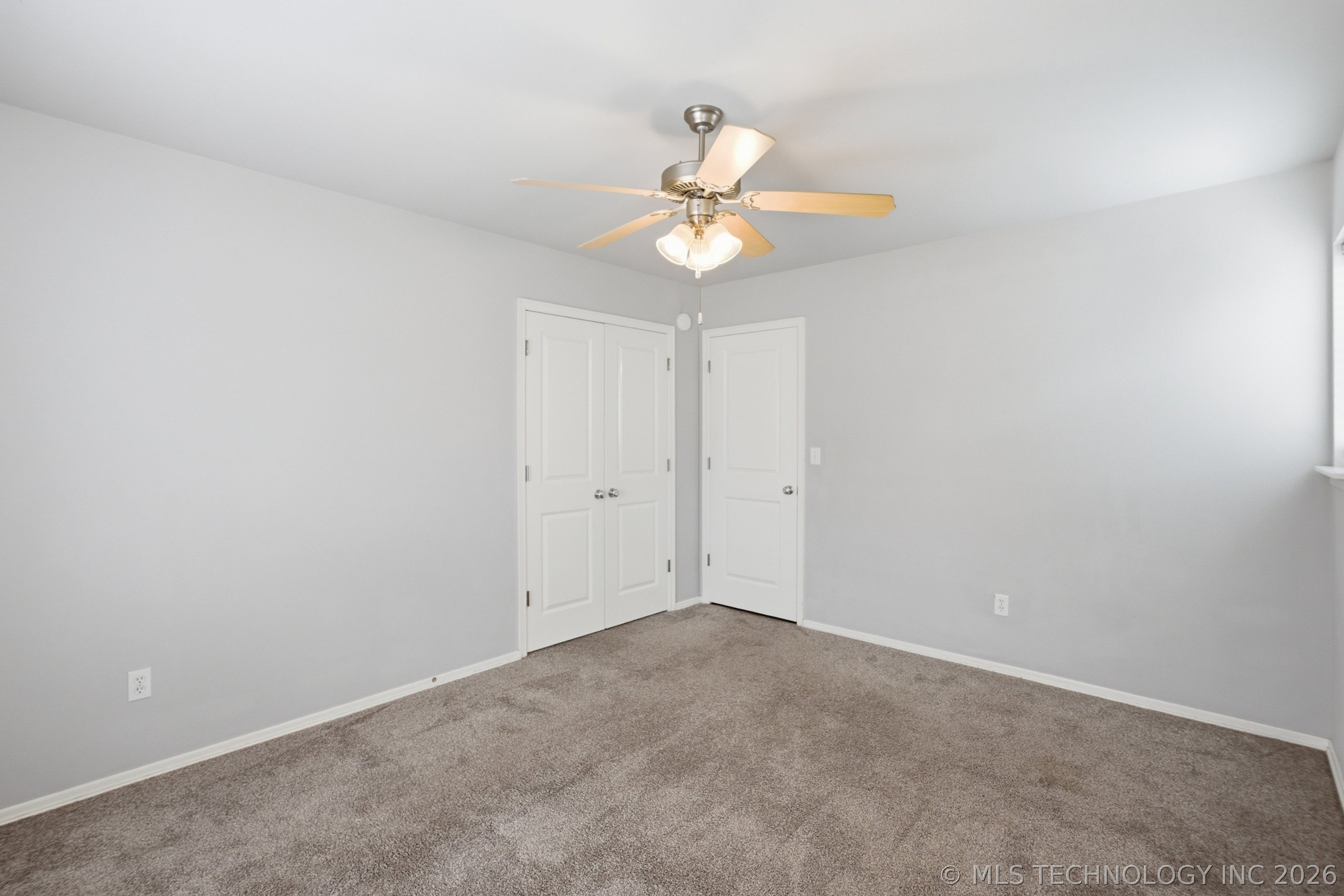 10305 N 115th East Avenue Property Photo 32